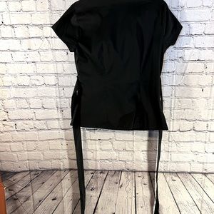 East 5th. Ladies fitted Black with six zipper and tie belt blouse